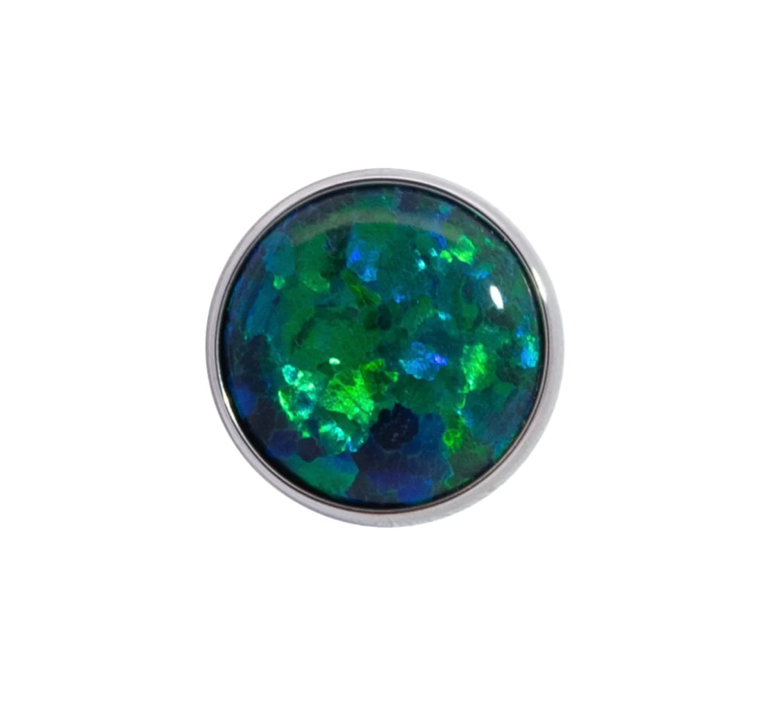 Titanium bezel set moss agate cabochon threadless top showing unique green natural patterns