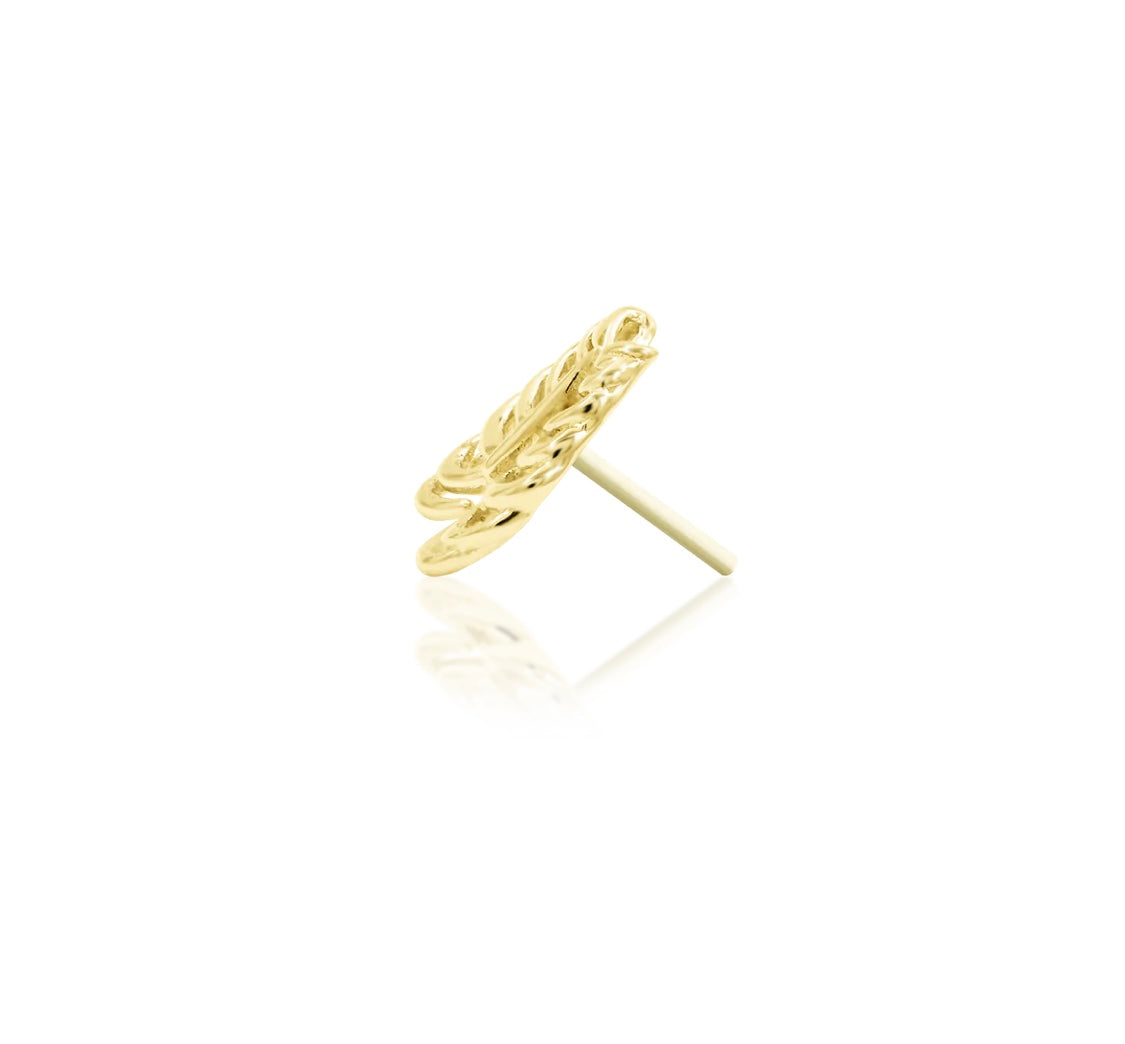 Close-up of 14ct solid gold rib cage threadless top 3.8mm x 12.3mm showing gothic anatomical design
