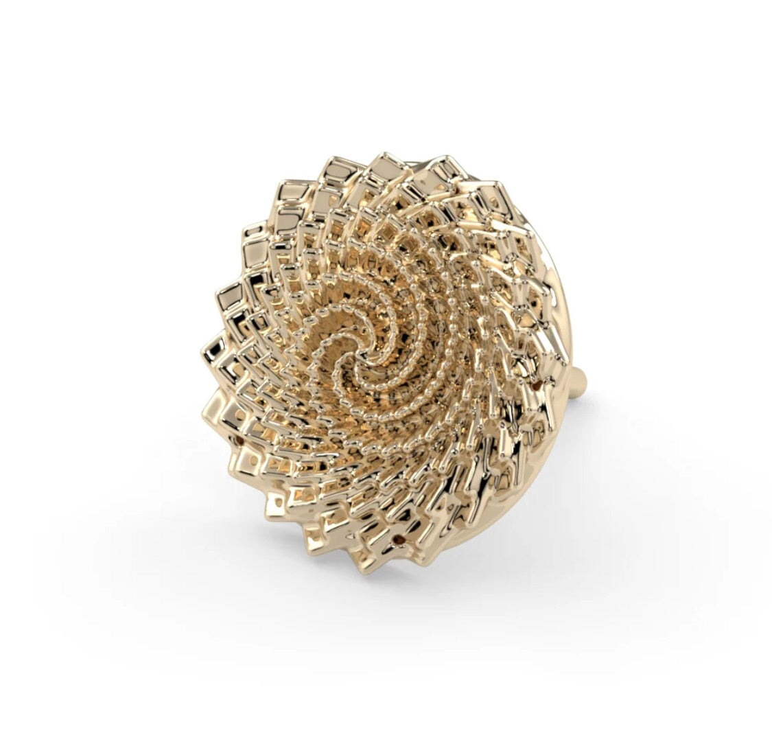 18ct gold circular spiral threadless top showing flowing minimalist design and cosmic symbolism